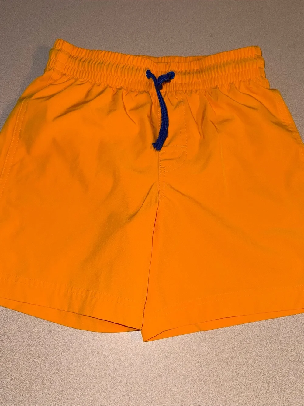 Old Navy boys size L 10-12 swim trunks yellowish orange with blue drawstring
